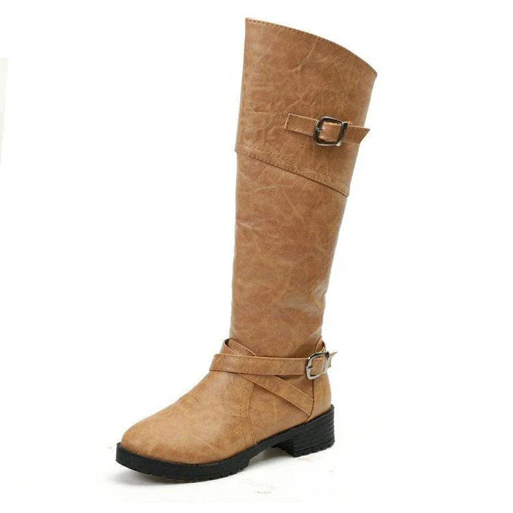 Stylish women's boots with low heels and a rounded toe, available in multiple colors and sizes
