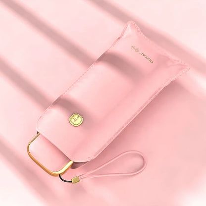 Chic and compact portable sun and rain umbrella in various colors, ideal for travel and outdoor events