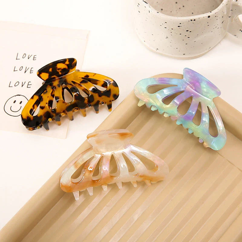 Stylish geometric hollow stripes barrettes in beige color, a fashionable hair accessory for women and girls