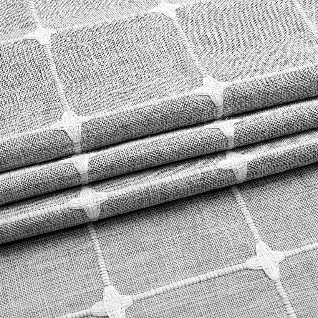 Elegant jacquard linen shower curtain with charming tassels in light grey color, adding sophisticated style to any bathroom