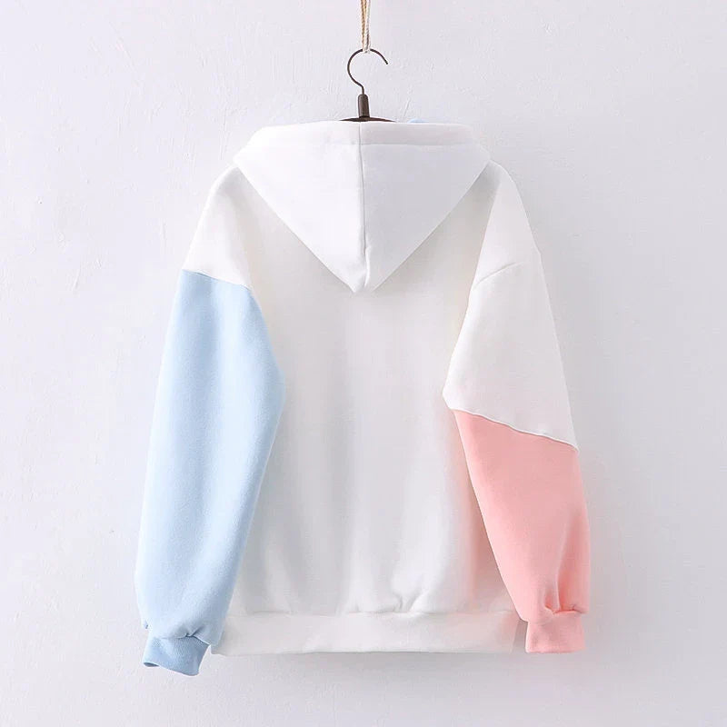 Cozy and stylish hooded sweater for trendy students, featuring plush velvet trim and oversized, slouchy fit for maximum comfort and warmth