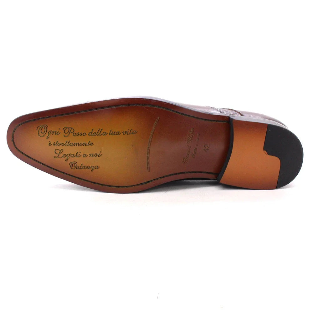 Premium handcrafted leather oxfords in brown with a pointed toe design, suitable for business and formal occasions.