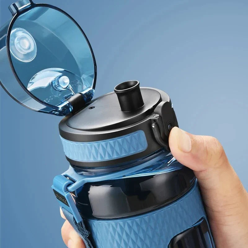 Portable sports water bottle with wide mouth, tea infuser, and leak-proof design for active lifestyles