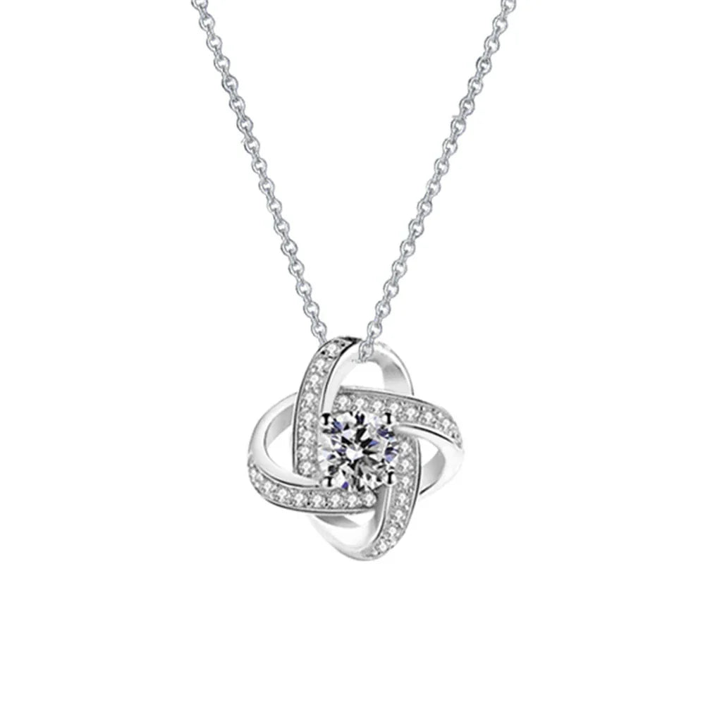 A dazzling diamond-accented star pendant necklace made of 925 sterling silver with a delicate clavicle chain, making a thoughtful holiday gift for her.