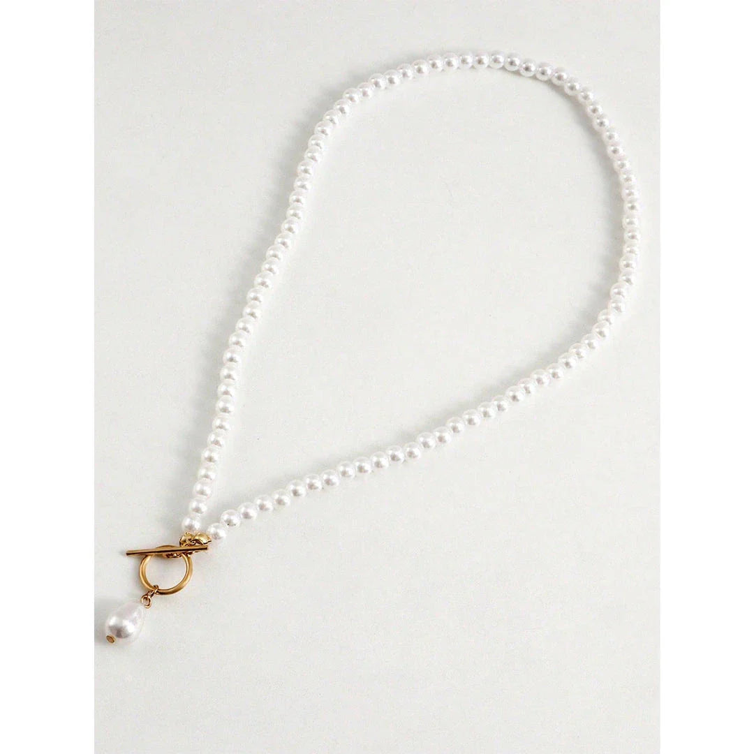 Elegant imitation pearl heart pendant necklace with lustrous bead chain and secure OT buckle closure