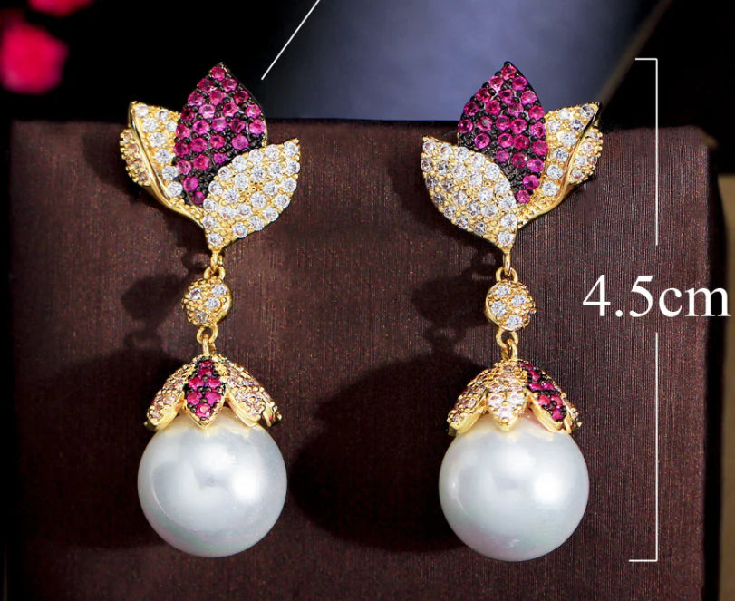 Elegant silver needle earrings with a leaf pearl accent, a versatile and stylish accessory for any occasion