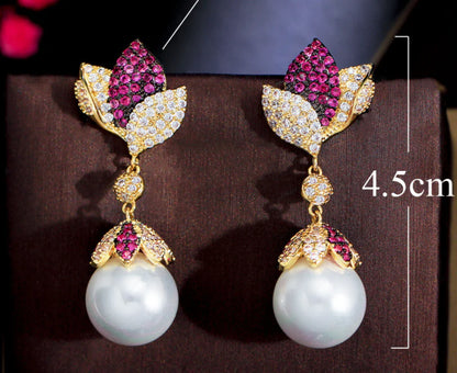 Elegant silver needle earrings with a leaf pearl accent, a versatile and stylish accessory for any occasion