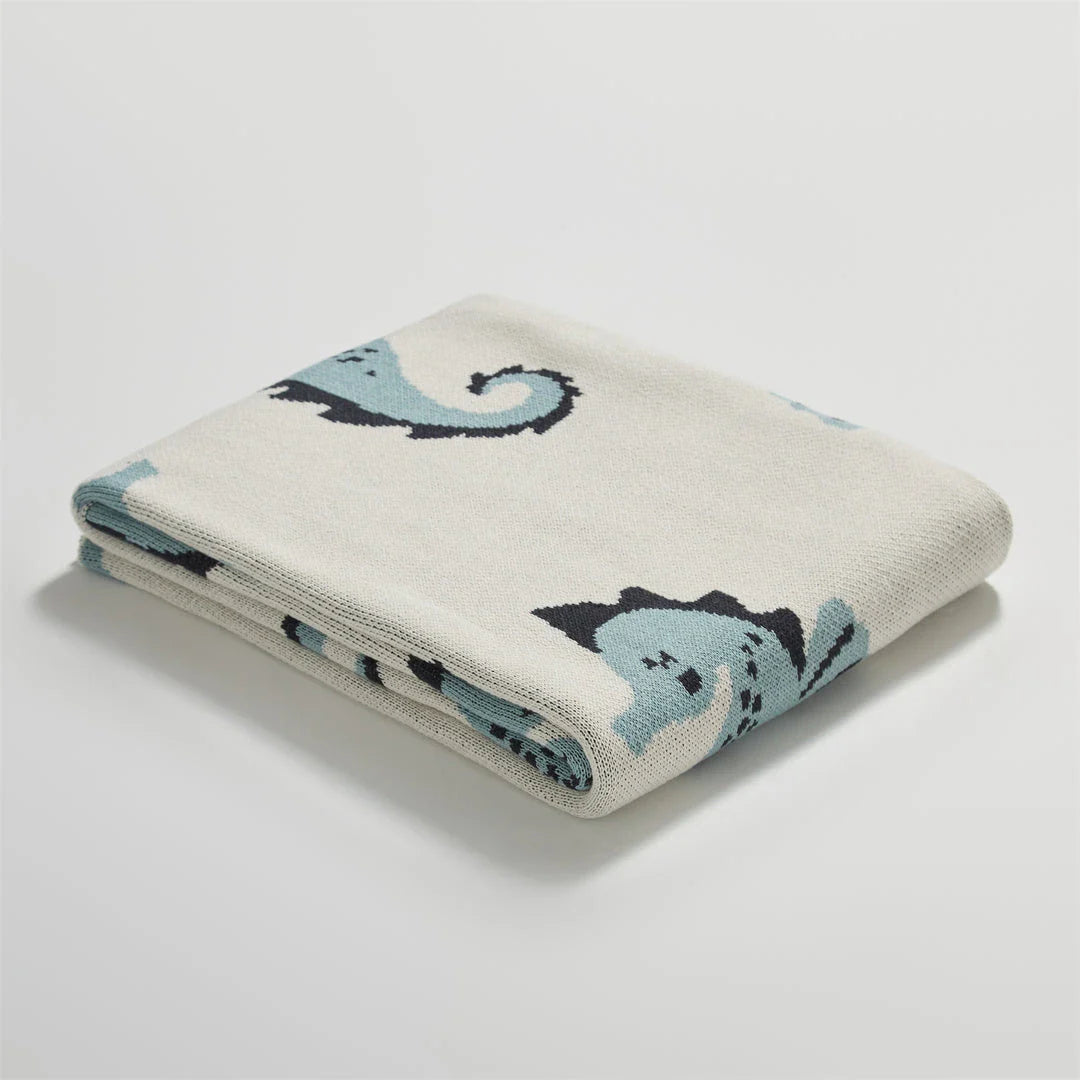 Cozy cotton blanket with cute sea horse design, perfect for relaxation and comfort