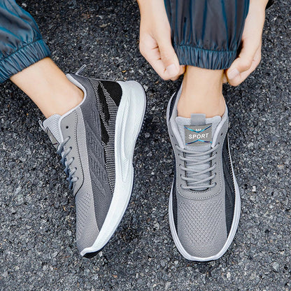 Breathable, comfortable color-blocked mesh sneakers for men with a durable rubber sole and secure lace-up closure
