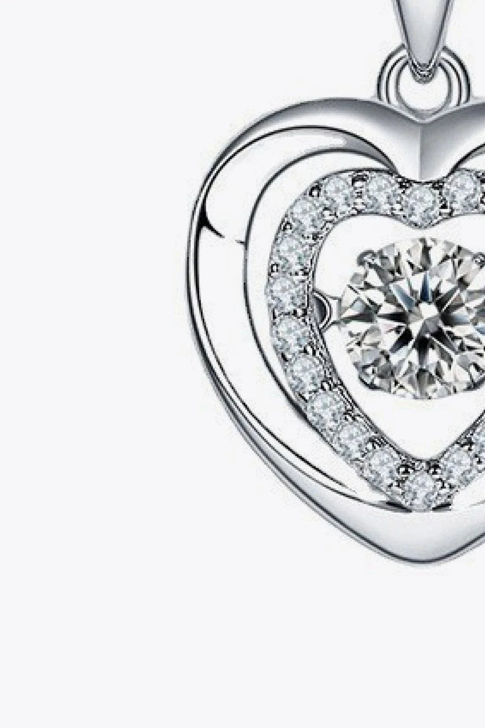 Captivating moissanite heart pendant necklace in sterling silver with a 0.5-carat center stone and sparkling accent stones