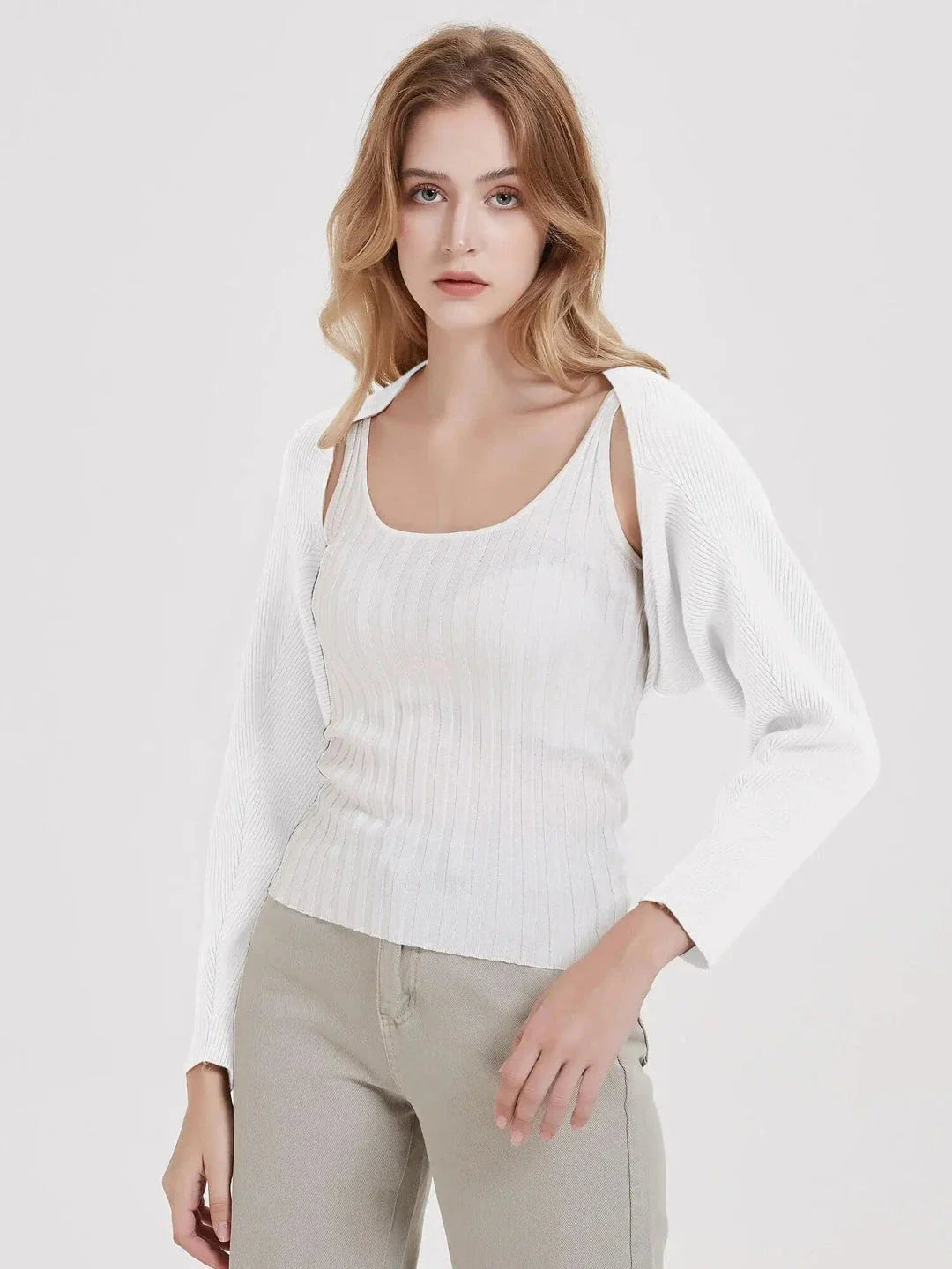 Cozy and chic long sleeve knit crop top cardigan in black, ivory, and camel colors