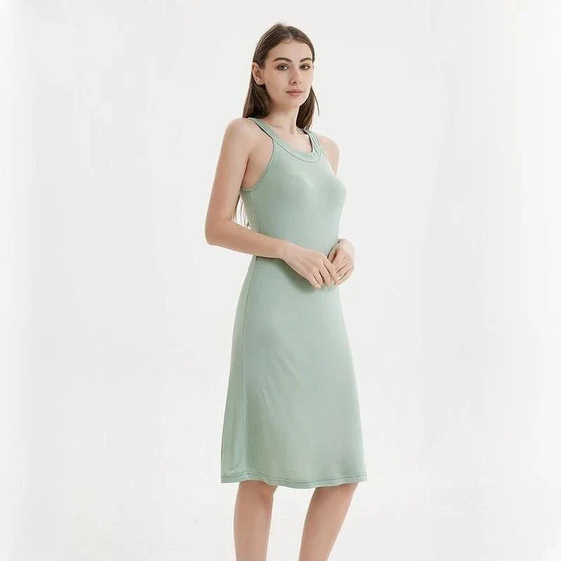 Elegant silk-blend halter neck midi dress in green and white colors, showcasing a chic and versatile design for modern American women.