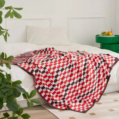 Cozy and stylish plaid blanket in blue, perfect for home decor, travel, and outdoor activities