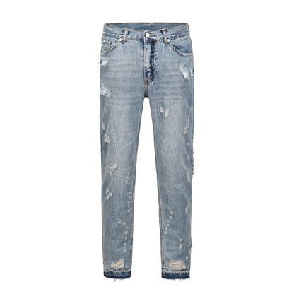 Premium distressed denim jeans with ripped detailing, perfect for casual streetwear style