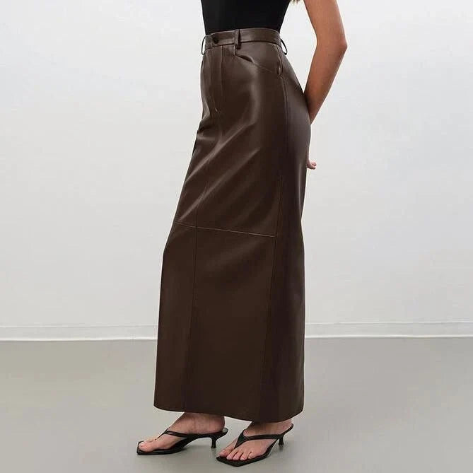 Elegant ankle-length faux leather skirt in vintage brown color, featuring a straight silhouette and empire waistline for a flattering fit.