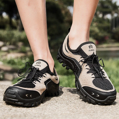 Couple wearing breathable mesh hiking shoes while exploring outdoor trails