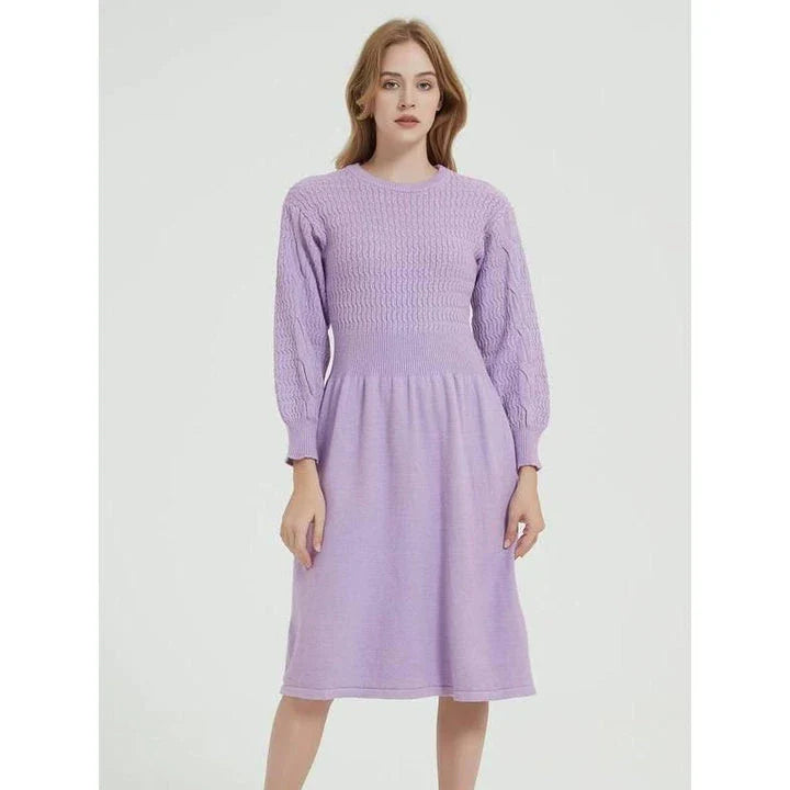 Elegant long sleeve knitted sweater dress in purple red with a classic A-line silhouette and mid-calf length