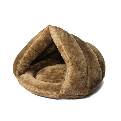 Cozy cat sleeping bag bed made of soft, plush coral fleece material for maximum comfort and relaxation