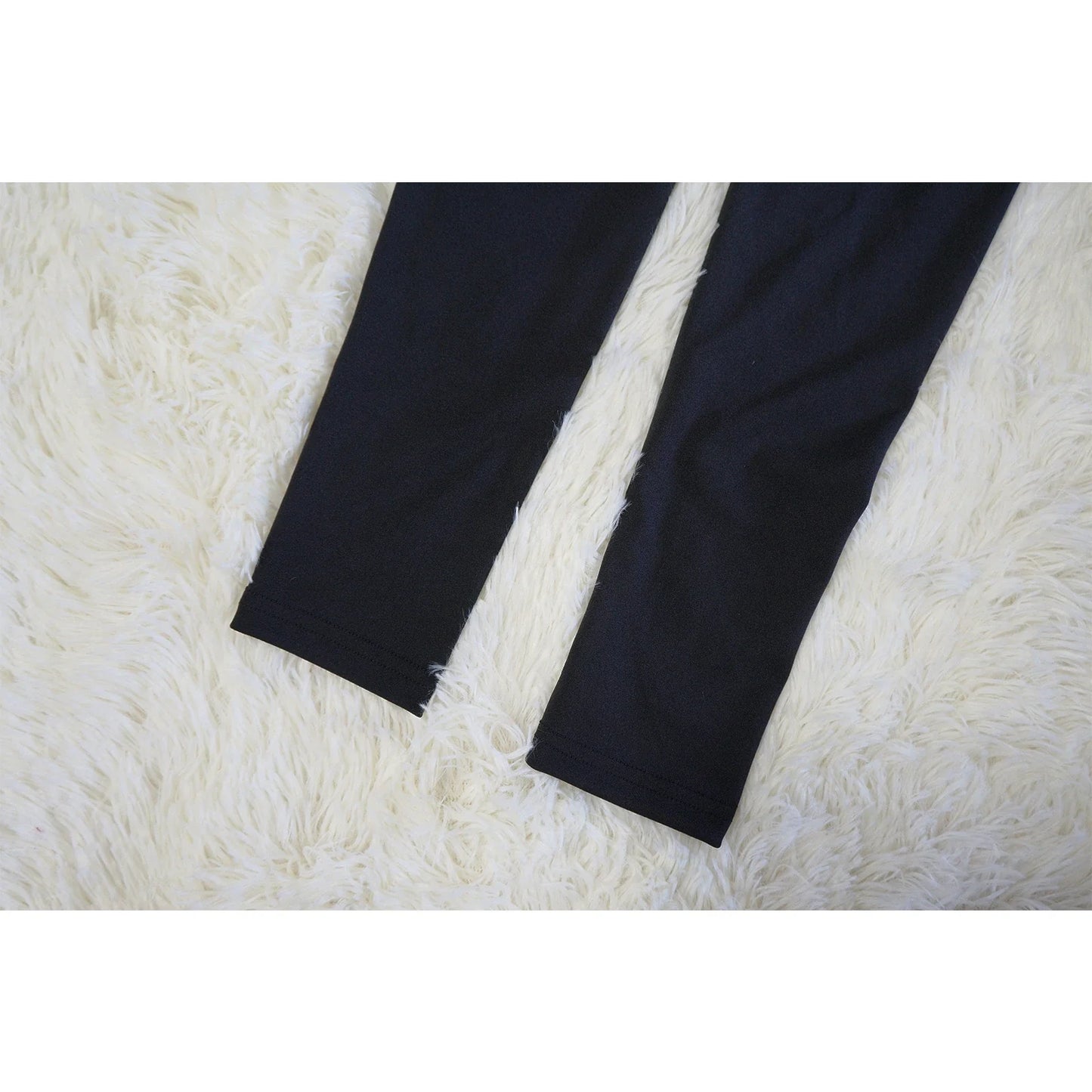 Stylish and flattering waist-accentuating split dress in solid colors, made from premium polyester fabric for comfort and versatility.