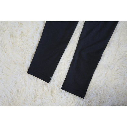 Stylish and flattering waist-accentuating split dress in solid colors, made from premium polyester fabric for comfort and versatility.