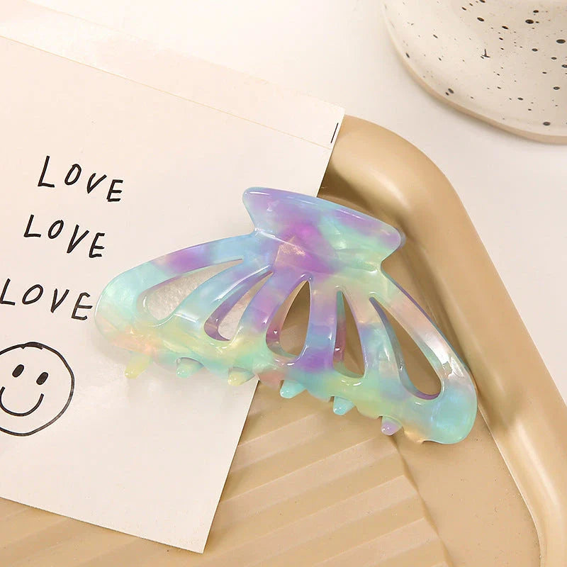 Stylish geometric hollow stripes barrettes in beige color, a fashionable hair accessory for women and girls