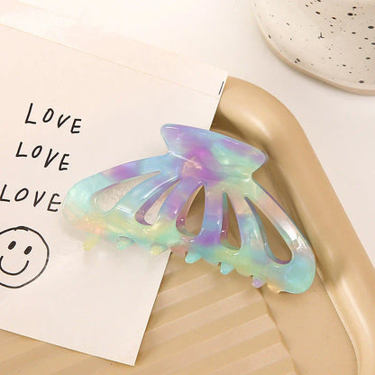 Stylish geometric hollow stripes barrettes in beige color, a fashionable hair accessory for women and girls