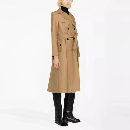 Elegant double-breasted women's trench coat in beige color with sash and pockets for a timeless, versatile style