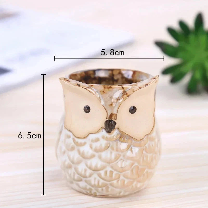 Adorable mini owl-shaped ceramic planter for small plants and succulents, featuring vibrant colors and vintage charm