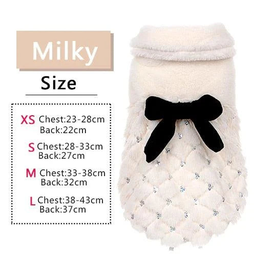 Cozy and stylish winter coat for pets, featuring a soft cotton exterior and plush faux fur lining for maximum warmth and comfort.
