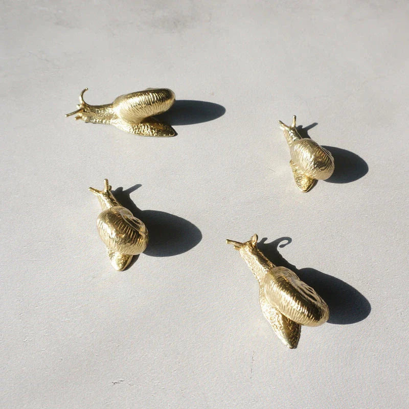 Elegant European-style retro brass snail cabinet door handles in small and large sizes for wardrobe, cabinet, and drawer upgrades