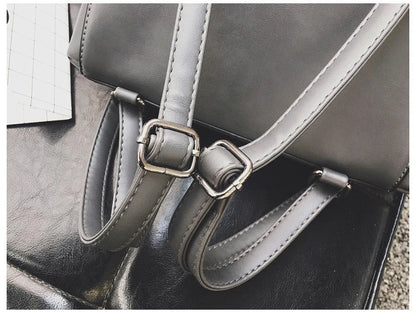 Versatile British-inspired shoulder bag made from high-quality PU leather with a spacious main compartment, convenient pockets, and an adjustable strap