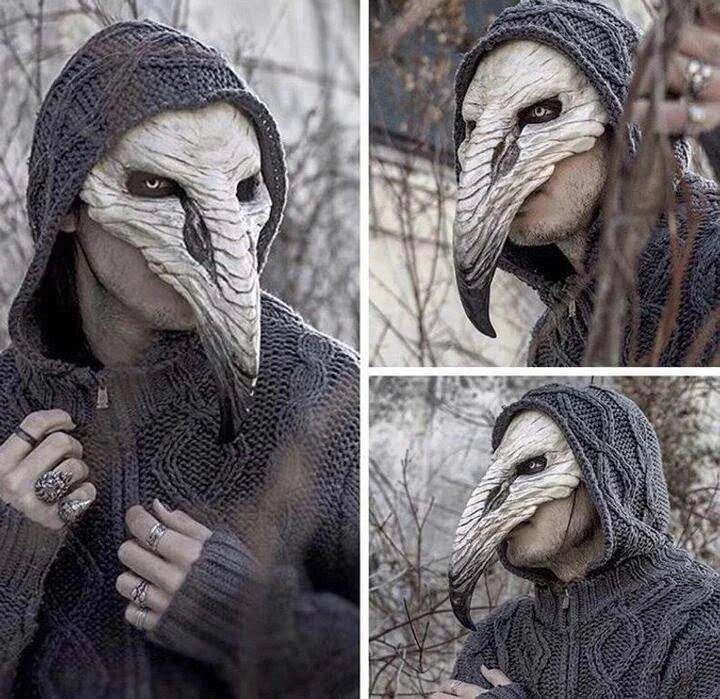 A chilling white latex plague doctor beak mask with a bone-colored finish, perfect for Halloween costumes and Gothic-inspired outfits.