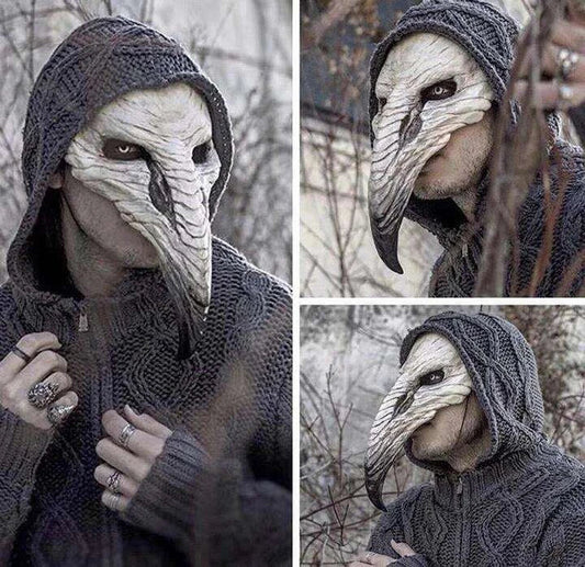 A chilling white latex plague doctor beak mask with a bone-colored finish, perfect for Halloween costumes and Gothic-inspired outfits.