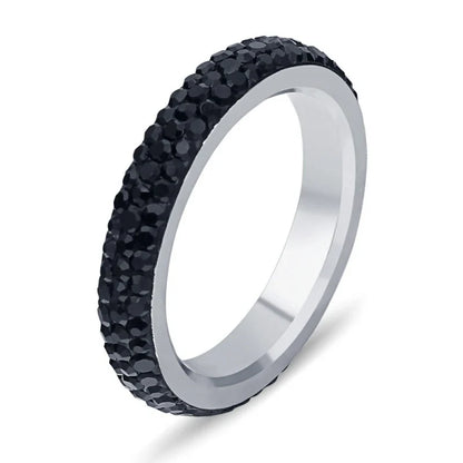 A personalized couple's ring made of stainless steel and adorned with sparkling rhinestones, symbolizing the beauty of your love story.