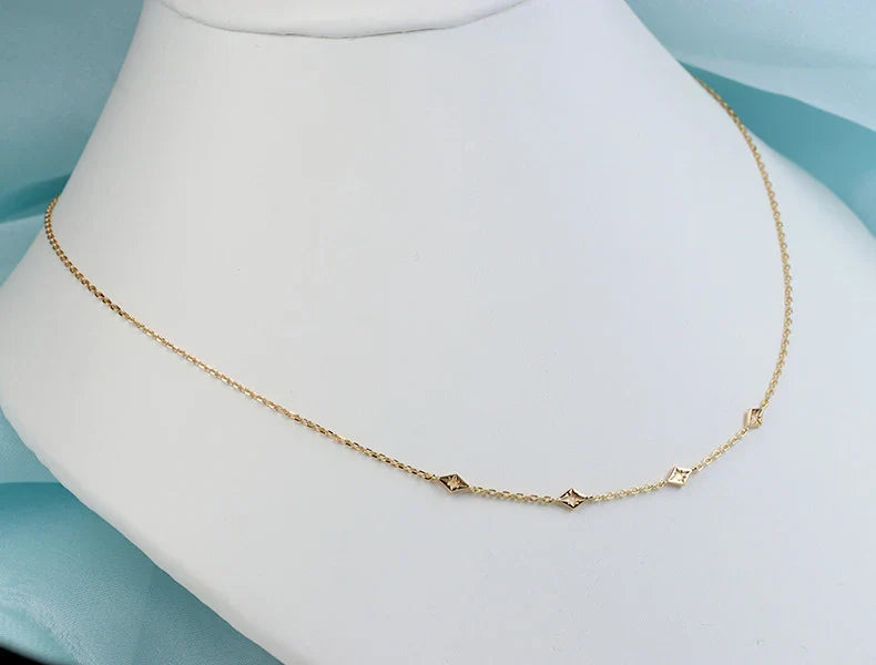 A sterling silver necklace with a delicate geometric pendant design, perfect for women's everyday wear and special occasions.