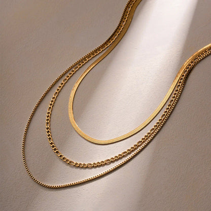 Elegant 18K gold plated stainless steel flat snake chain necklace with letter charms for a unique, personalized look