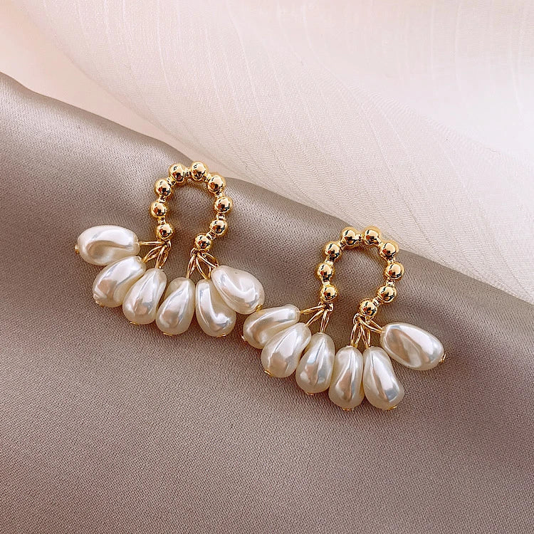 Elegant Baroque pearl earrings with a shimmering alloy, silver, or gold-plated finish