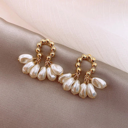 Elegant Baroque pearl earrings with a shimmering alloy, silver, or gold-plated finish