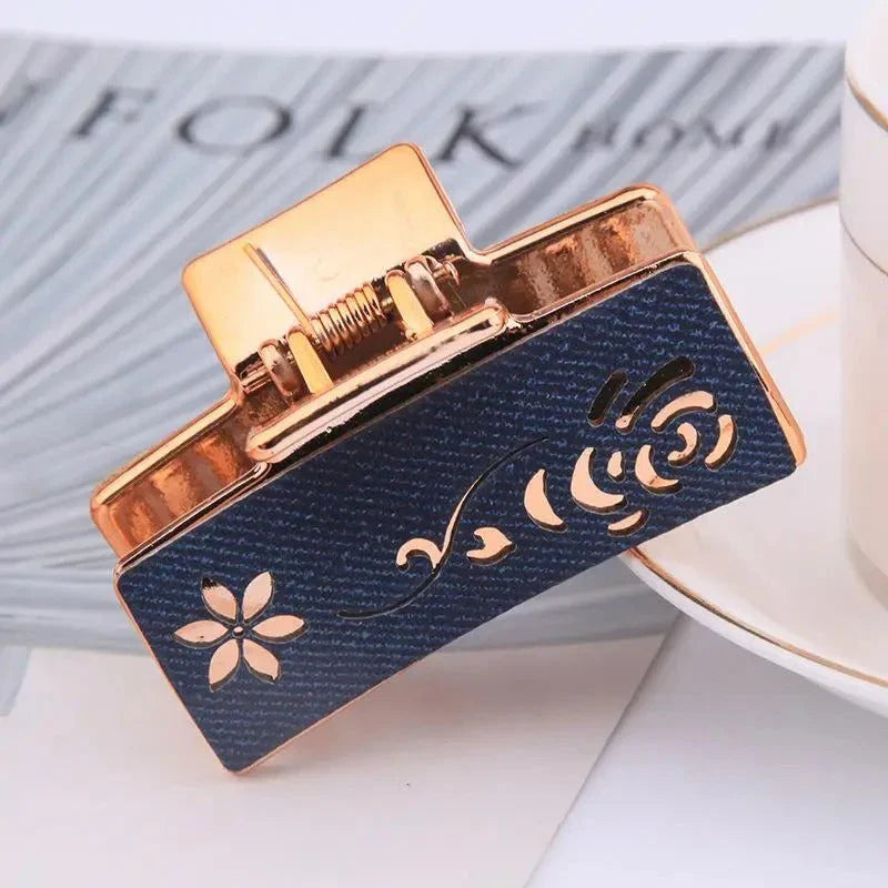 Elegant floral hair claw accessory for women, featuring a premium canvas and rubber design in a stylish brown color