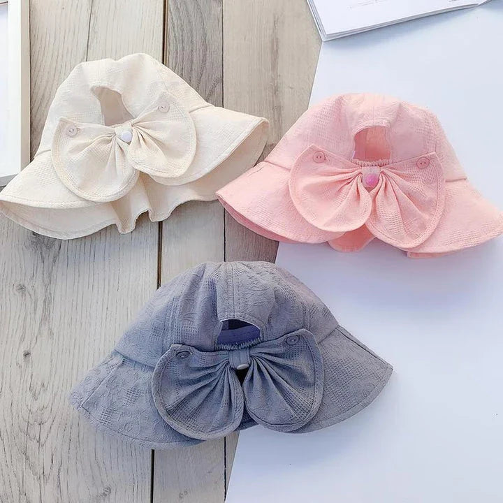 Adorable princess-inspired baby bucket hat with soft cotton material and wide brim for sun protection