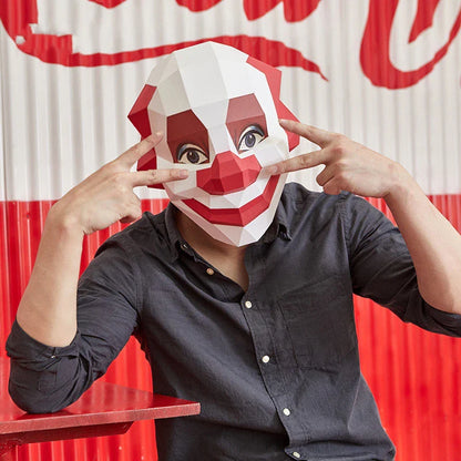 Handmade cardboard Smiling Scary Clown Cosplay Prop with unsettling features for Halloween decorations and costumes