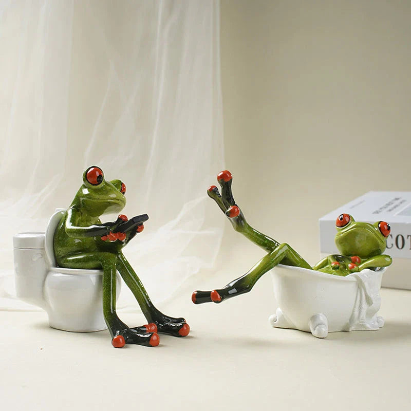 Resin frog figurines in a bathtub, adding a playful touch to bathroom decor