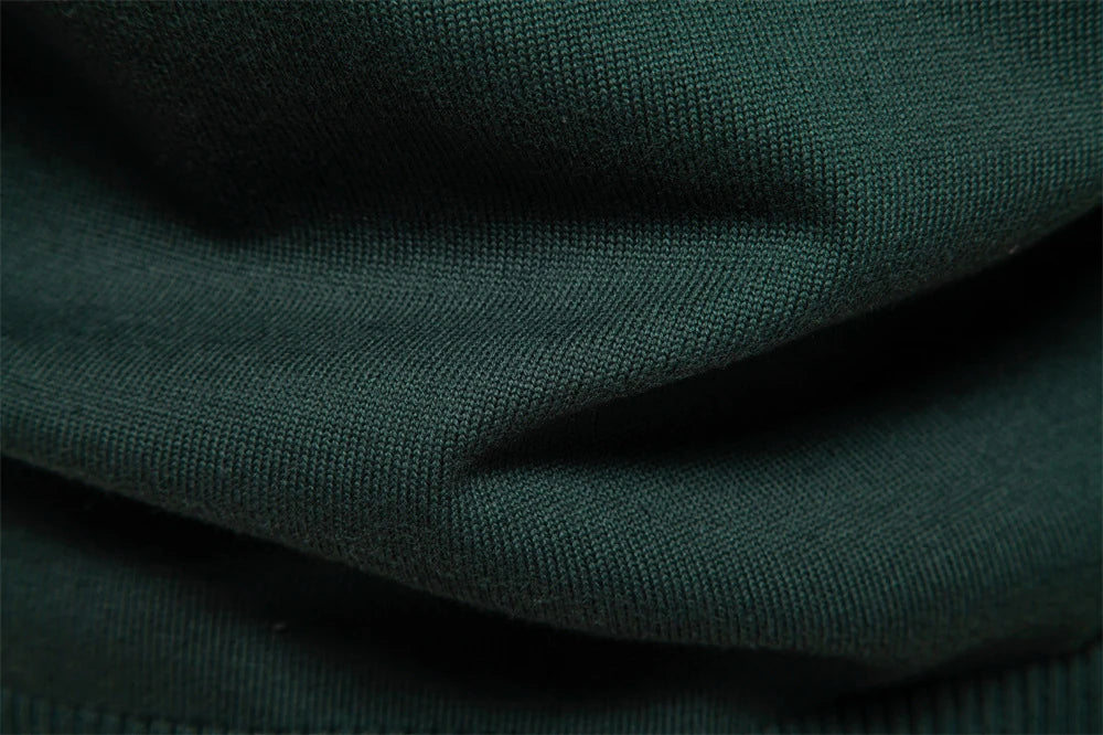 Cozy autumn and winter half-zip sweater in green, dark blue, khaki, and light gray colors