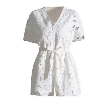 Chic embroidered hollow-out summer playsuit with a V-neck, high waistline, and short sleeves for a stylish and comfortable vacation or casual look.