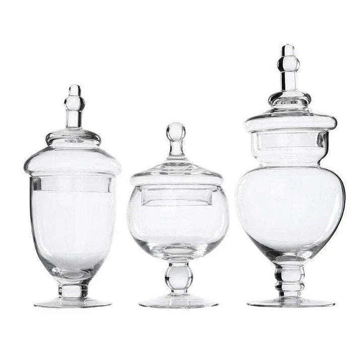 A transparent glass candy jar with an airtight lid, suitable for weddings, parties, and home decor