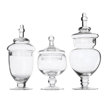 A transparent glass candy jar with an airtight lid, suitable for weddings, parties, and home decor