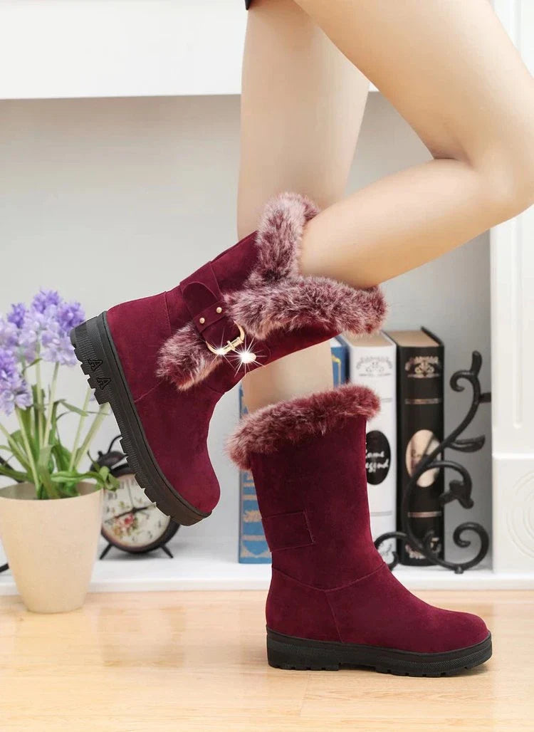 Women's winter snow boots in black, brown, and wine red colors with flocking upper material, wedge heel, and buckle closure