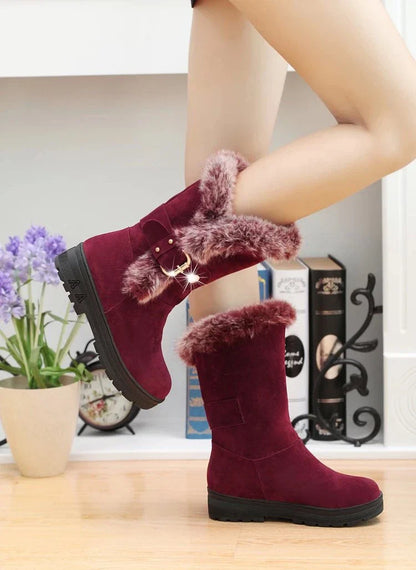 Women's winter snow boots in black, brown, and wine red colors with flocking upper material, wedge heel, and buckle closure