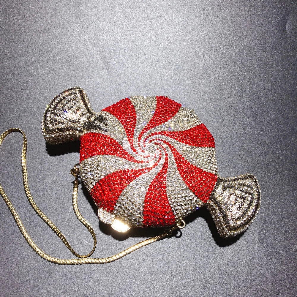 A stylish candy-shaped bag adorned with sparkling rhinestones, featuring a compact and versatile design perfect for everyday use.