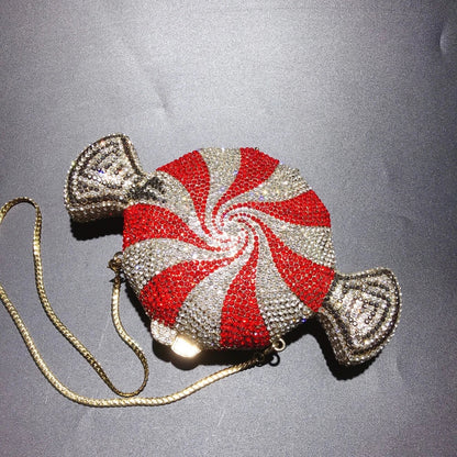 A stylish candy-shaped bag adorned with sparkling rhinestones, featuring a compact and versatile design perfect for everyday use.
